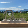 Schriftzug Daheeme – Sternhalter aus Holz